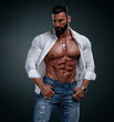 Muscular Male Model Wearing Unbuttoned White Shirt Exposing His Muscular Torso