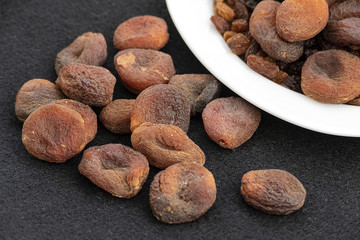 Wall Mural - dried apricots, day dry on a plate apricots, dired apricots specific natural turkey,
