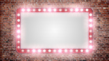 A Blank Marquee Sign On A Red Brick Wall With Flashing Lights.	
