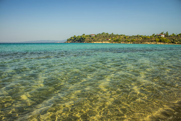 Wall Mural - paradise scenic landscape of beautiful resort vacation destination Indian ocean bay shallow water and island shoreline with trees and cottages apartments 