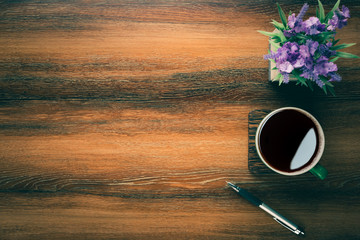 Aufkleber - Wood office desk table with cup of coffee, pen and plant pot. Top view with copy space, flat, lay.
