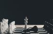 © Looker_Studio - chess board game for ideas and competition and strategy, business success concept