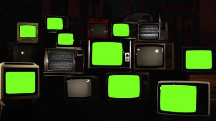 Wall Mural - stacked retro tvs turning on green screens. you can replace green screen with the footage or picture