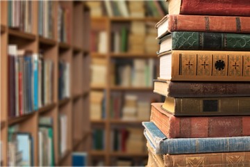 Collection of old books  on background