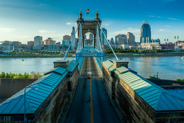 Panoramic view of Cincinnati downtown with the historic Roebling suspension bridge over the Ohio river