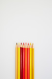 Fototapeta Las - Red and Yellow Color pencils  on white