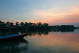 Fototapeta Pomosty - Beautiful sunset on the rever with boat in Thailand