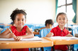 © Tom Wang - Smiling elementary school kids  in classroom