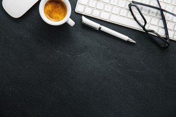 Wall Mural - Office table with cup of coffee, keyboard and notepad