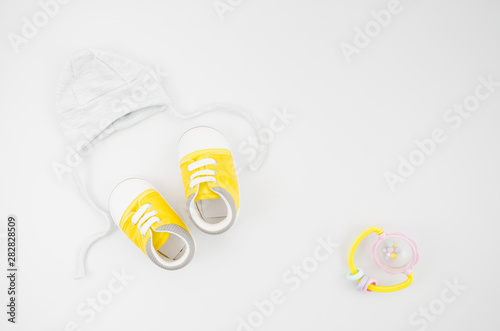 Flat Lay Baby Clothes With White Background Buy This Stock Photo
