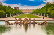 © H-AB Photography - Great view of the Apollo Fountain (Bassin d'Apollon) in the classic French formal garden with the green carpet (Tapis Vert), the Latona Fountain (Bassin de Latone) and the Versailles Palace behind.