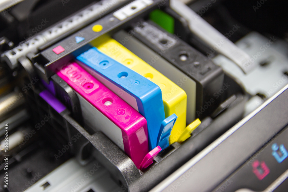 An ink cartridge or inkjet cartridge is a component of an inkjet printer that contains the ink four color - obrazy, fototapety, plakaty 