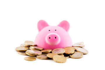 Wall Mural - Pink piggy bank with euro coins on white background