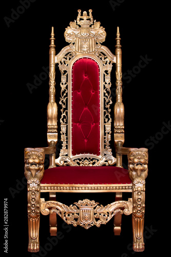 Fotomural Red royal chair isolated on black background