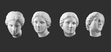 Four Gypsum Copy Of Ancient Statue Venus Head Isolated On Black Background. Plaster Sculpture Woman Face.