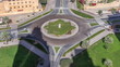 Aerial view of a roundabout circle road in Dubai downtown from above timelapse. Dubai, United Arab Emirates.