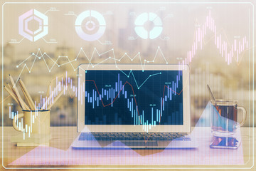 Financial market graph hologram and personal computer on background. Double exposure. Concept of forex.