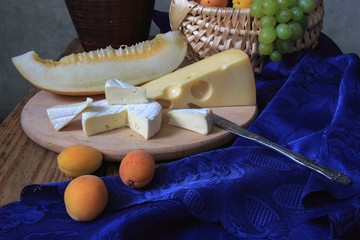 Wall Mural - Still life with cheese and melon slice