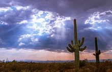 Sunrays And Storm Clouds Over Arizona Desert