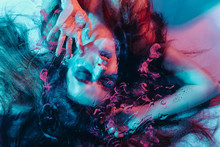Surreal Portrait Of Red Haired Girl Like A Mermaid Behind The Glass With Under Water Effects. Asking For Help