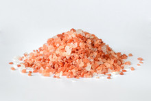 Heap Of Pink Himalayan Salt Crystals On White Background. Himalayan Salt Is Used In Cooking, Medicine And Cosmetology.
