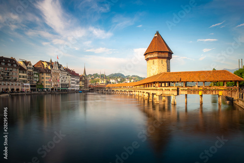 Fotomural Sunset in historic city center of Lucerne with famous Chapel Bridge and lake Lucerne in Canton of Lucerne, Switzerland