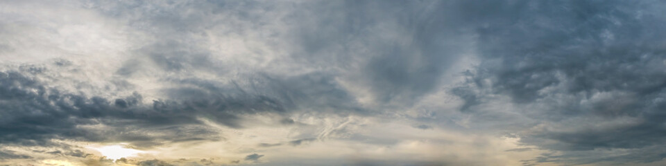 dramatic panorama sky with storm cloud on a cloudy day. panoramic image.