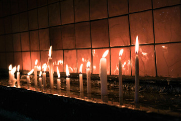 Candles in the dark of a church