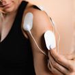 © Microgen - Shoulder Physical Therapy with TENS Electrode Pads, Transcutaneous Electrical Nerve Stimulation