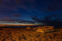 Rocks And Big Stones At Dawn At The Rocky Coast At La Mata Near The Spanish City Torrevieja. It's An Hour Before Sunrise. Constellation Big Dipper.