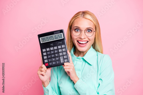 Fotografía Close up photo of impressed manager holding calculator show statistics scream wo