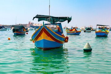 Wall Mural - Taditional eyed boats Luzzu in Marsaxlokk, Malta