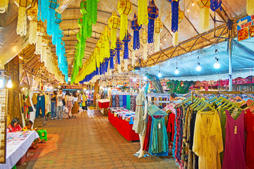 Canvas Print - The alley of clothes section of Kalare Night Market, Chiang Mai, Thailand