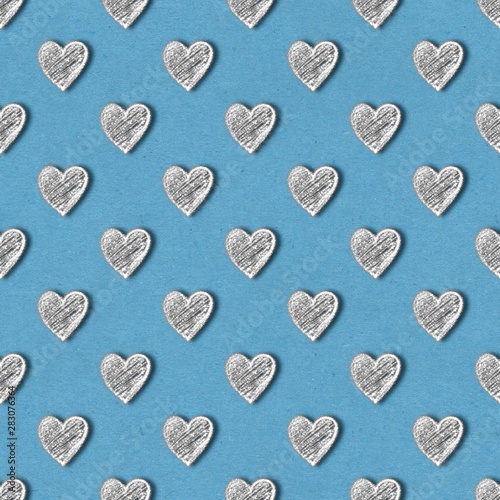 Silver hearts seamless pattern. Glitter on blue background