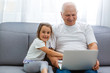 © Angelov - Grandfather and granddaughter play