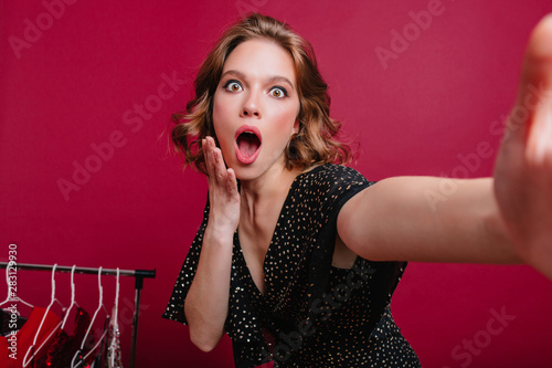 Shocked Short Haired Pale Girl With Tattoo Making Selfie In