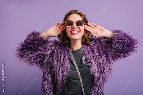 Studio Shot Of Fascinating Young Woman With Short Hair Laughing On