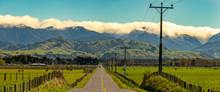 Rural Road From The Eastern Hills To The Cloud Covered Tararua Ranges In Wairarapa New Zealand