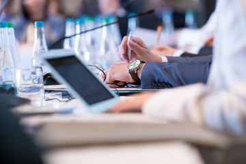 Wall Mural - close up of business people hands using laptop computer