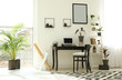 © New Africa - Trendy room interior with different home plants and laptop on table. Space for text