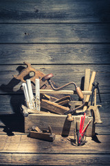 Vintage place of carpenters work on rustic wooden table