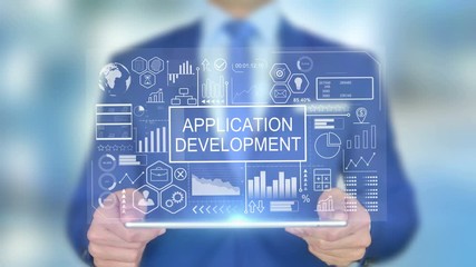 Application Development, Businessman with Hologram Concept
