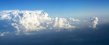 Thick Clouds Are Accumulating At The Blue Sky, Weather Concept In Panoramic Format, Copy Space