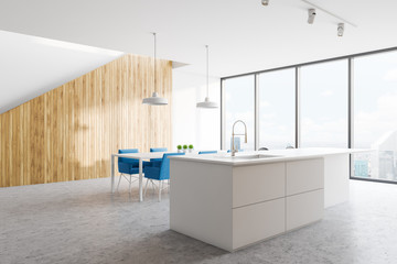 White and wooden kitchen with bar and island