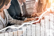 © InfiniteFlow - Double Exposure Image of Business and Finance - Businessman with report chart up forward to financial profit growth of stock market investment.