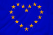 © kittyfly - stylized European Union flag, symbol of united Europe on soft silk with soft folds, close-up