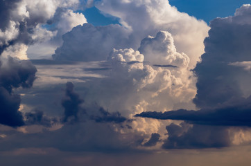 Beautiful stormy cumulus clouds in the sky, background.