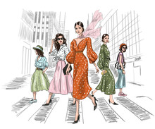Five Women Walking On A Crosswalk In Big City