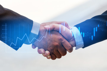 Wall Mural - Partnership. business man handshake with graph chart of stock market investment trading for Forex trading, business partner, digital technology, internet communication, teamwork, partnership concept