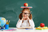 Fototapeta Panele - funny child   schoolgirl  girl student about school blackboard